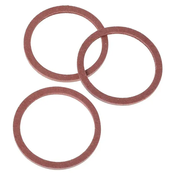 Fiberdichtung - ¾″, 3 Stk. - Drei rosa Dichtungsringe auf einem schwarzen Hintergrund. Die Ringe sind leicht überlappend angeordnet und scheinen aus Gummi oder Kunststoff zu sein.