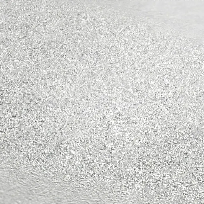 A.S. Création Industrial Vliestapete - Hellgrau, Uni, 10,05 x 0,53 m - Detailaufnahme einer weißen, strukturierten Oberfläche, ideal als neutraler Hintergrund für Produktpräsentationen.