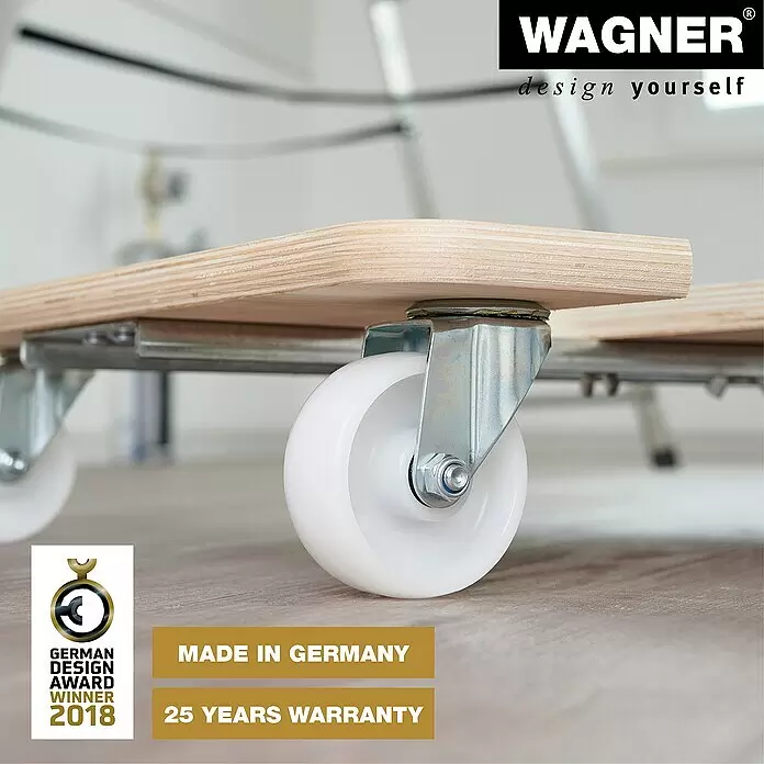 Wagner System Transportroller MM 1332 - Traglast: 200 kg, Holz, B x H: 490 x 135 mm - Nahaufnahme einer hellen Holz-Transportrollplatte mit weißen Lenkrollen auf einem Boden.