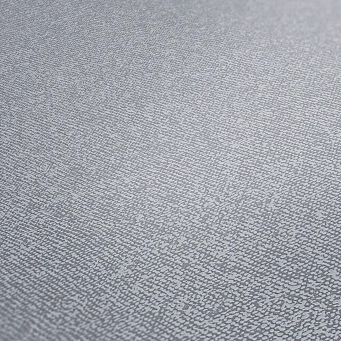 A.S. Création New Elegance Vliestapete I - Grau, Uni, 10,05 x 0,53 m - Nahaufnahme einer grauen strukturierten Oberfläche, ideal für Textilien oder Wandbeschichtungen mit subtilem Muster.