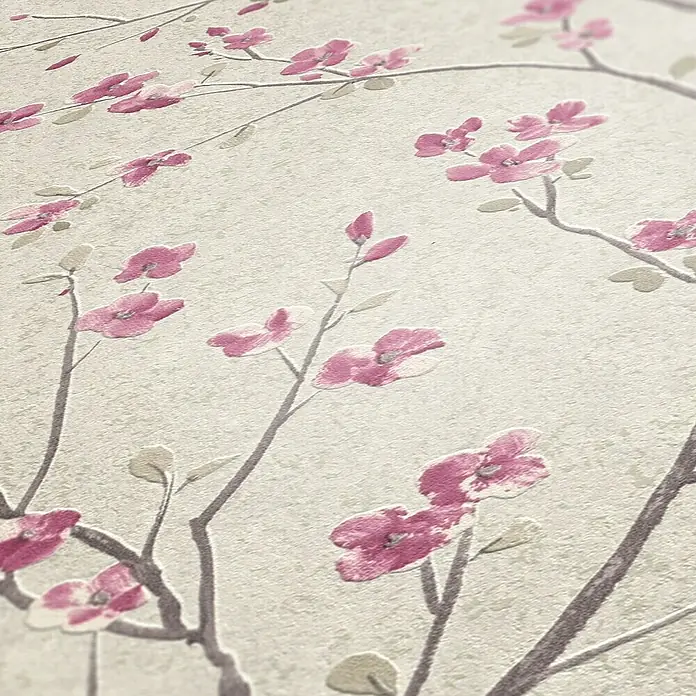A.S. Création Metropolitan Stories II Vliestapete Kirschblüte - Creme, Floral, 10,05 x 0,53 m - Nahaufnahme einer strukturierten Tapete mit Kirschblütenmuster in Rosa und Grau. Ein Hauch von Frühling für Ihre Wände.