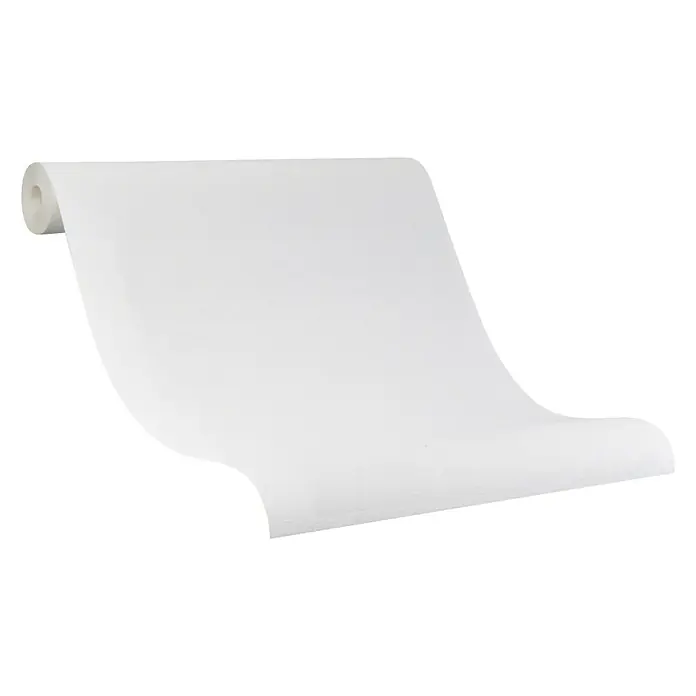 SCHÖNER WOHNEN-Kollektion Vliestapete I - Weiß, Uni, 10,05 x 0,53 m - Papierrolle: Eine Rolle aus weißem Papier, teilweise abgerollt, auf einer ebenen Fläche liegend. Ideal für Kunst, Handwerk oder zum Abdecken.