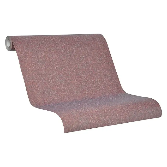 SCHÖNER WOHNEN-Kollektion Vliestapete Unistruktur - Braun, Uni, 10,05 x 0,53 m - Nahaufnahme einer Rolle strukturierter, rosafarbener Tapete, die ihre Textur und Farbe hervorhebt, ideal für Innenarchitekturprojekte.