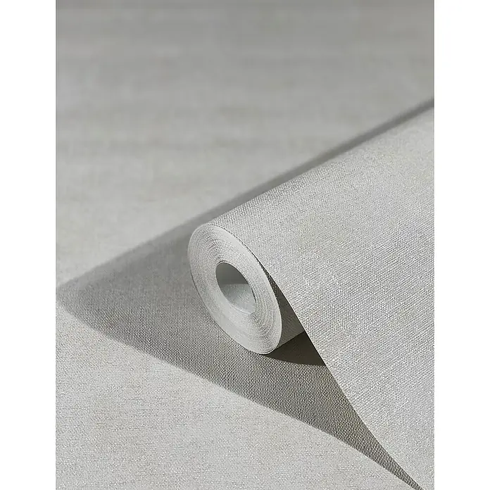 Marburg Sand & Stones Vliestapete Shades - Greige, Uni, 10,05 x 0,53 m - Nahaufnahme einer Rolle grauer Textiltapete, die die feine Textur und das dezente Design des Produkts hervorhebt.