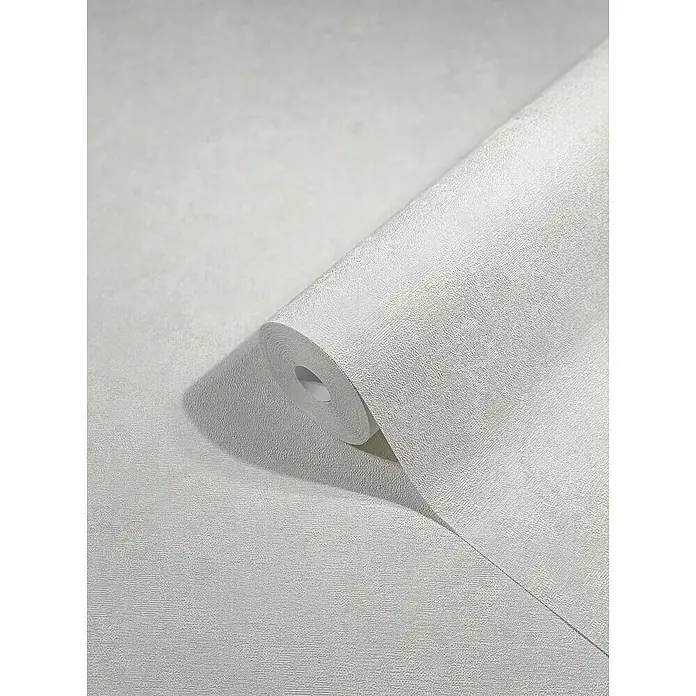 Marburg Sand & Stones Vliestapete Modernista - Creme, Uni, 10,05 x 0,53 m - Nahaufnahme einer Rolle weißer Tapete mit dezenter Textur, die sich perfekt für moderne Innenräume eignet und eine elegante Note verleiht.