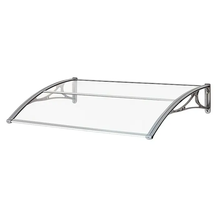 Superroof Pultvordach Formentor mit LED - 120 x 74 x 28,5 cm, Grau - Dieses Bild zeigt eine transparente Vordachmarkise mit silberfarbenem Rahmen, die Schutz vor Witterungseinflüssen bietet und gleichzeitig modern aussieht.