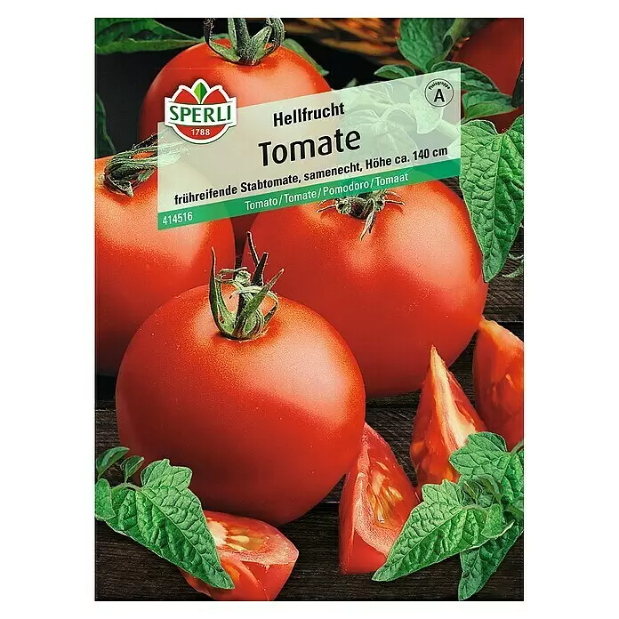 Sperli Gemüsesamen Tomate - Hellfrucht, Solanum lycopersicum, Erntezeit: Juli - Samenpackung für 'Hellfrucht Tomate', mit reifen roten Tomaten und grünen Blättern auf Holzuntergrund.