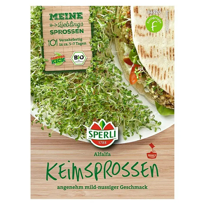 Sperli Gemüsesamen Keimsprossen - Alfalfa, Medicago sativa, Erntezeit: Ganzjährig - Produktfoto von "Sperli Alfalfa Keimsprossen" mit der Aufschrift "angenehm mild-nussiger Geschmack" auf einer hellbraunen Holzoberfläche.