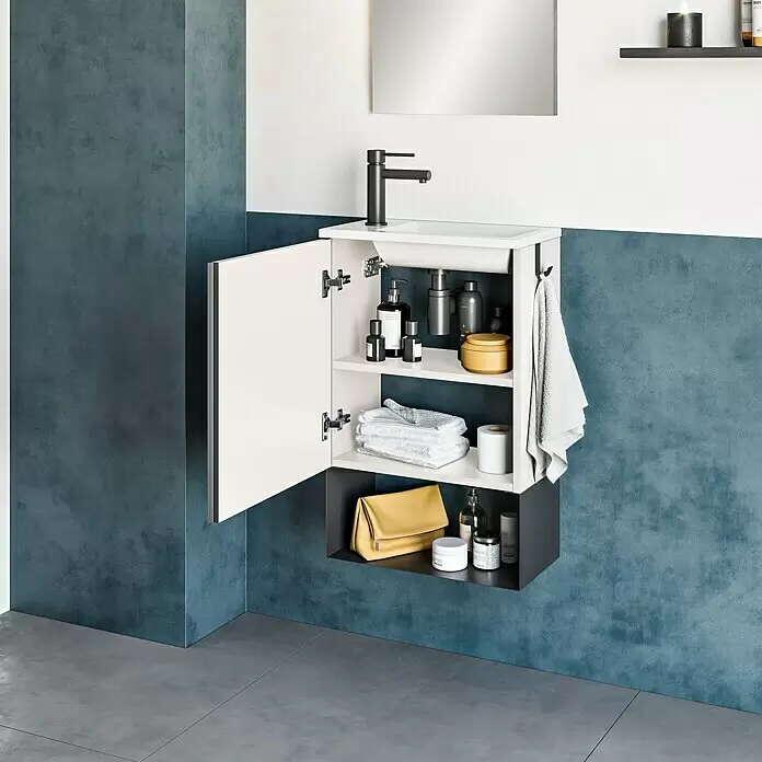 Riva Conjunto de mueble de baño Indus - Ancho total del mueble de baño: 45,3 cm, Blanco, Negro, Brillante, 3 pzs. - Mueble de baño blanco suspendido con grifo negro, abierto para mostrar estantes de almacenamiento para artículos de tocador y toallas.