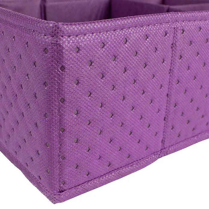 Organizador acolchado - 1 cajón, Lila - Primer plano de un cubo de almacenamiento de tela morada con un estampado de puntos, ideal para organizar objetos.