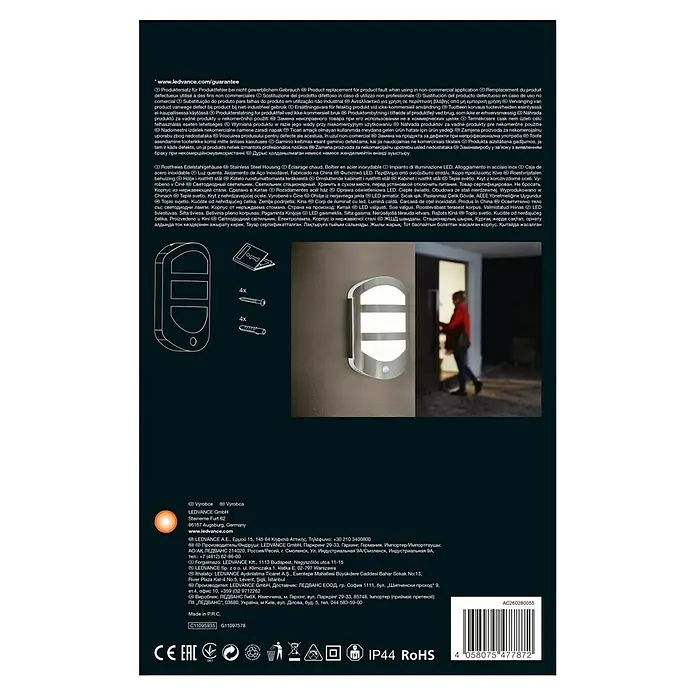 Ledvance LED-Außenwandleuchte Endura - 12,5 W, 180 x 60 x 283 mm, Edelstahl, IP44, Mit Bewegungssensor - Produktverpackung einer LEDVANCE Außenleuchte mit Edelstahlgehäuse, die warmweißes Licht spendet und mit Montagematerial geliefert wird.