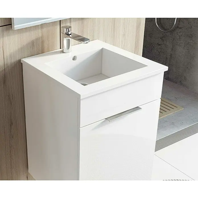 Badmöbel-Set Qubo Plus - Gesamtbreite Badmöbel: 40 cm, Weiß, Hochglänzend, 2 -tlg. - Dieses Bild zeigt einen weißen Waschbeckenunterschrank mit einem modernen Wasserhahn und einem schlichten Griff, der sich perfekt in ein modernes Badezimmer einfügt.