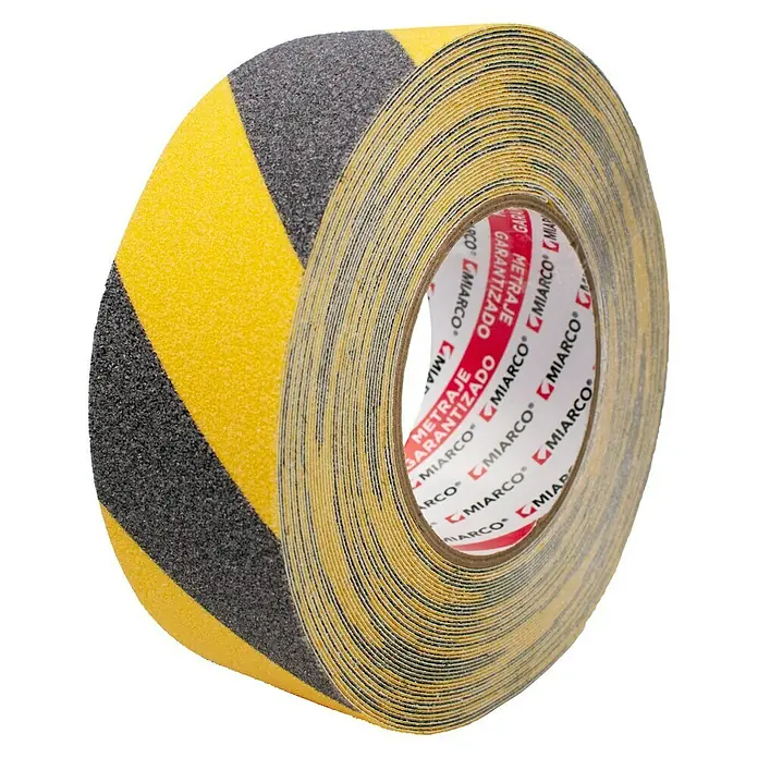 Cinta antideslizante - L x An: 15 m x 5 cm, Amarillo/Negro - Un rollo de cinta antideslizante de rayas amarillas y negras. Cinta adhesiva antideslizante para mayor seguridad en superficies lisas.