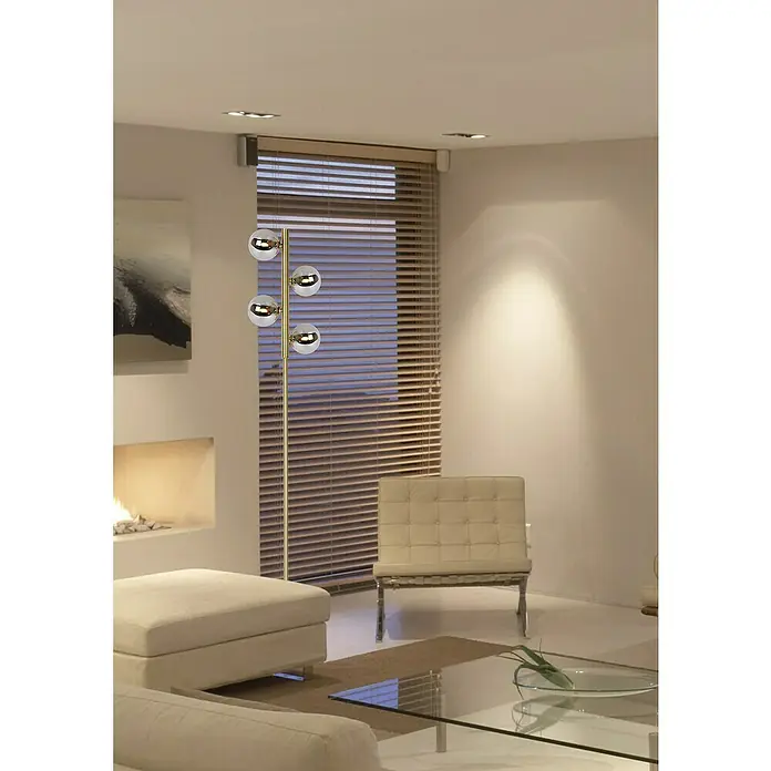 Lucide Tycho StehleuchteHöhe: 154 cm, Gold - Elegante Stehlampe mit mehreren kugelförmigen Lampenschirmen in einem modernen Wohnzimmer. Das Design fügt sich nahtlos in die Einrichtung ein.