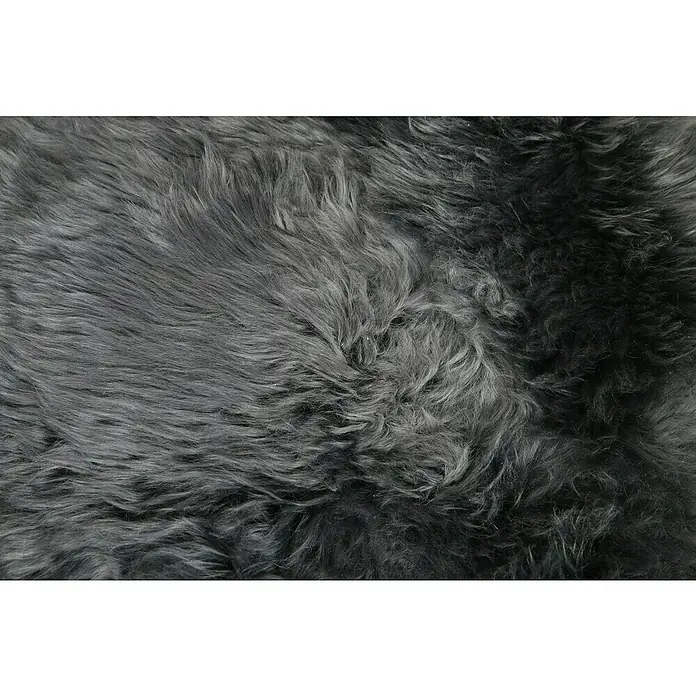 Esbeco Schaffell - Dunkelgrau, 80 x 50 cm, 100 % Echtfell - Detailaufnahme eines grauen Schaffells mit dichter, flauschiger Textur, ideal für Teppiche oder Dekoration.