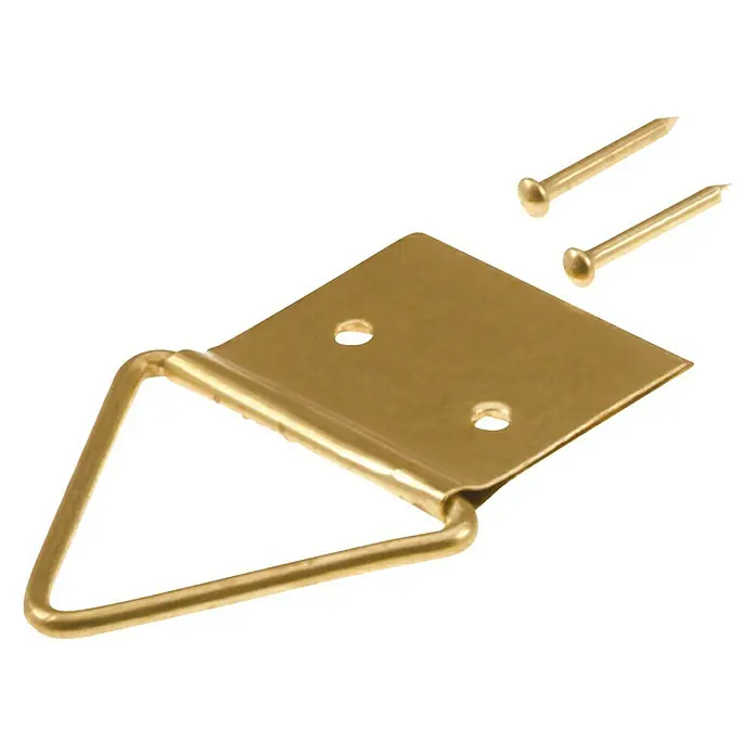 Suki Gancho para colgar cuadros GR2 - L x An: 24 x 12 mm, 10 ud. - Primer plano de un colgador de cuadros dorado con dos clavos, ideal para colgar cuadros y marcos de forma segura en la pared.