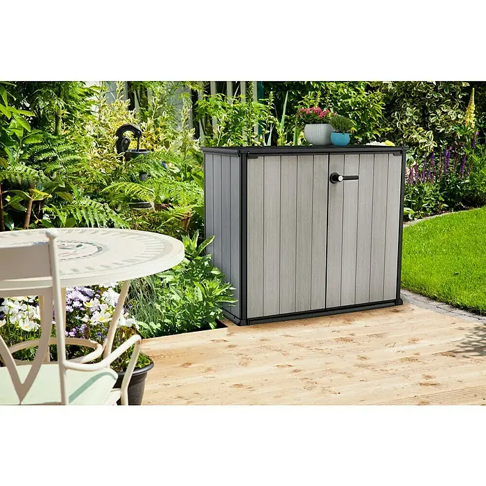 Keter Truhe Patio Store - L x B x H: 73,6 x 140 x 120 cm, Grau - Die graue Aufbewahrungsbox mit schwarzen Kanten fügt sich nahtlos in den Garten ein. Ideal zur Aufbewahrung von Gartengeräten und -zubehör.