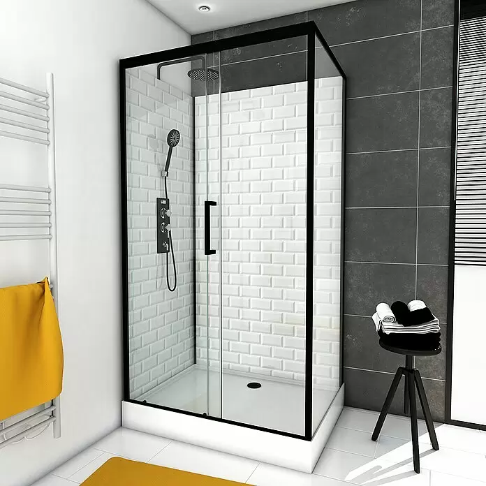 Aurlane Komplettdusche Metro 110 - 80 x 110 x 230 cm, Weiß/Schwarz/Silber - Moderne schwarzgerahmte Glasduschkabine mit weißem Unterbau in einem gefliesten Bad.