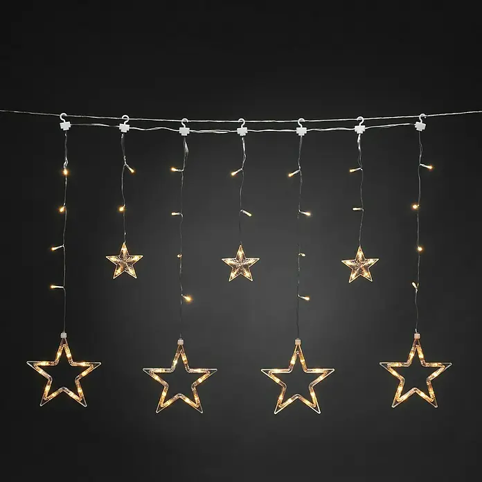 Konstsmide LED-Weihnachtsdekoleuchte LED Lichtervorhang Sterne Bernstein - 590 x 90 x 39 cm, Klar, Netzbetrieben, LED - Lichterkette mit Sternen. Die hängende Lichterkette mit mehreren warm leuchtenden Sternen ist eine festliche Dekoration für den Innenbereich.