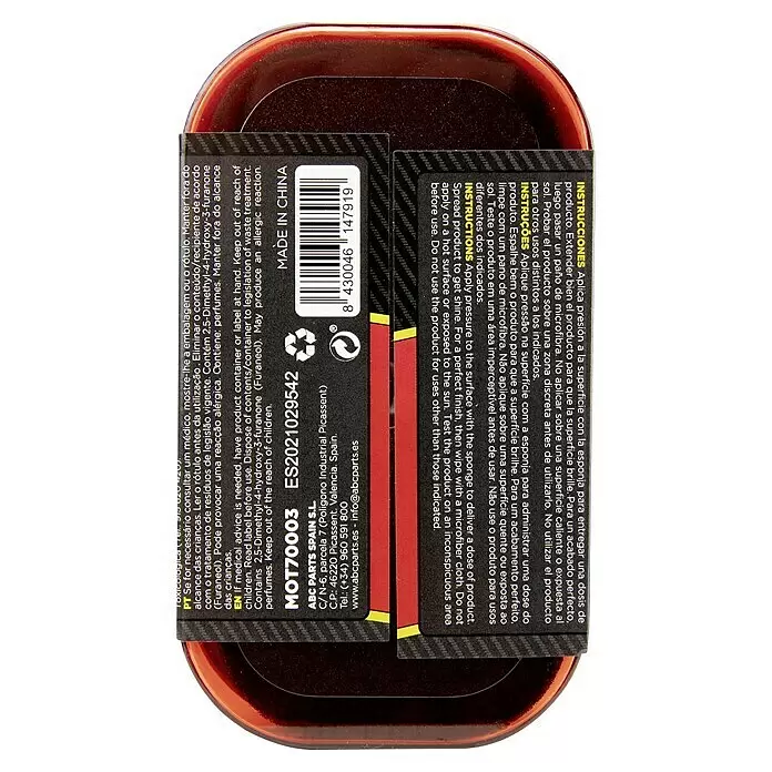 Esponja limpiadora para salpicaderos - Fresa - Envase ovalado marrón rojizo oscuro para producto de cuidado del coche con etiqueta multilingüe.