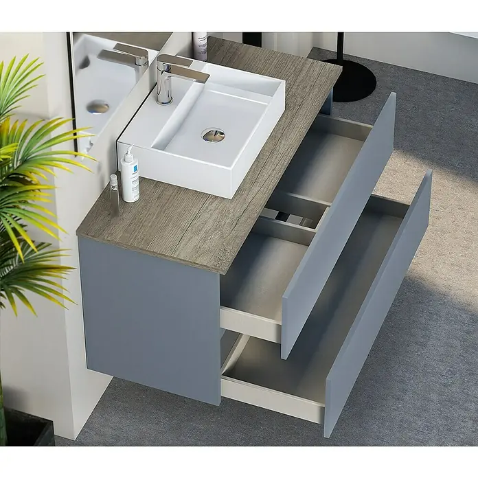 Artysan Mueble bajo de lavabo Fons - 46 x 100 x 56 cm, Azul - Toma de ángulo alto de un mueble de baño con cajones abiertos y un lavabo empotrado en una encimera con aspecto de madera.