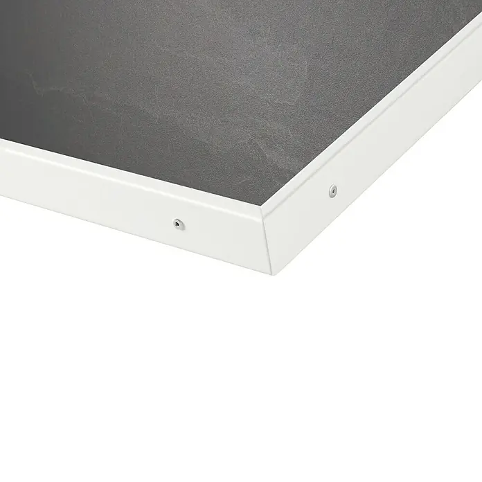 Jollytherm Infrarot-Keramikheizkörper - B x H: 600 x 1.200 mm, 1.100 W, Natursteinoptik - Detailaufnahme einer modernen, grauen Tischplatte mit weißem Rahmen.Minimalistisch, perfekt für moderne Büros oder Wohnräume.