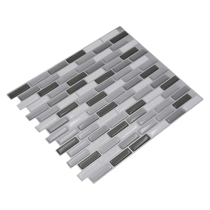 Selbstklebemosaik SVM 24086 - 23,6 x 25,5 cm, Grau/Silber, Glänzend - Nahaufnahme eines rechteckigen Wandaufklebers mit einem Mosaikmuster in Grau-, Silber- und Weißtönen, ideal für eine stilvolle Küchenrückwand.