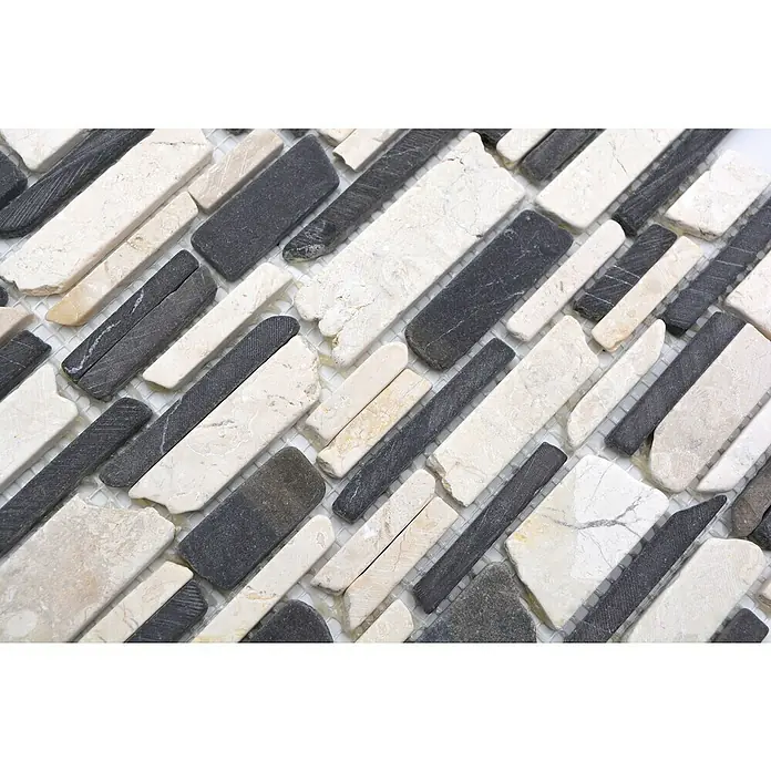 Mosaikfliese Mix MOS BRICK 205 - 30,5 x 30,5 cm, Schwarz/Weiß, Matt - Nahaufnahme von Mosaikfliesen mit länglichen schwarzen und weißen Steinen auf einem Netzträger. Perfekt für Badezimmer- oder Küchenrückwände.