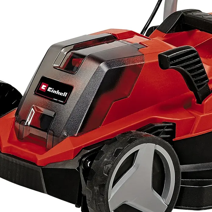 Einhell PXC 18V Cortacésped de batería GE-CM 18/33 Li - 18 V, 1 batería, 4 Ah, Ancho de corte: 33 cm - Primer plano de un cortacésped Einhell, que muestra su carcasa roja y el logotipo prominente de Einhell en la carcasa del motor.