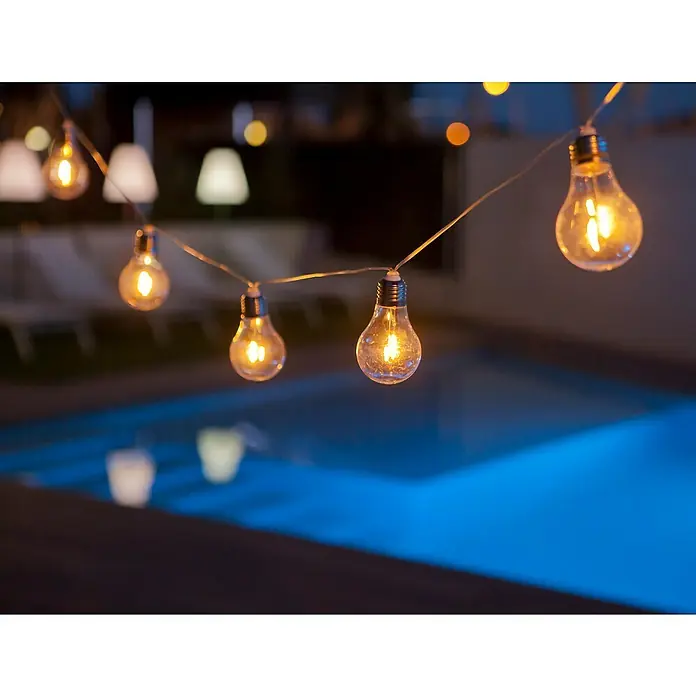 New Garden Guirnalda luminosa solar Stella - IP44, Largo: 4,5 m, 10 ud. - Guirnalda de luces con bombillas que ilumina la zona de la piscina, creando un ambiente relajante al aire libre.
