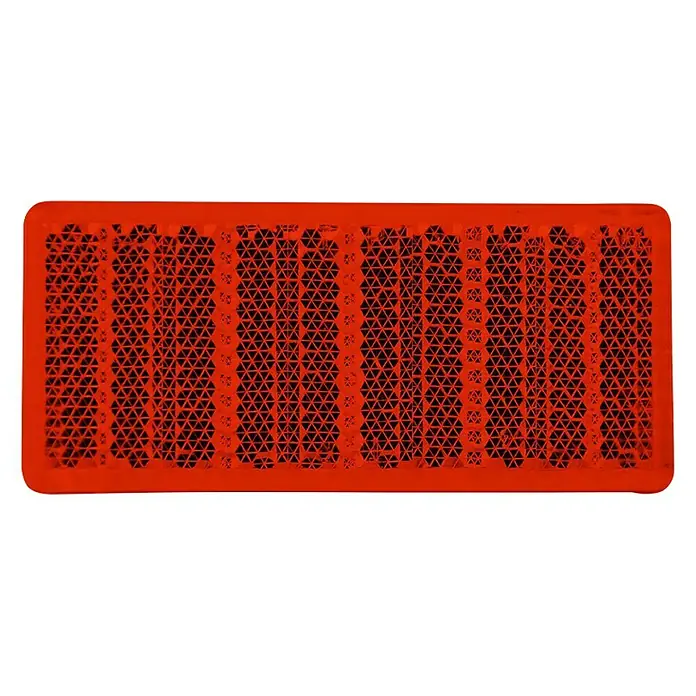 Stema Reflektor - 69 x 31,5 mm - Roter Reflektor mit dreieckigem Gittermuster, ideal für erhöhte Sichtbarkeit und Sicherheit.
