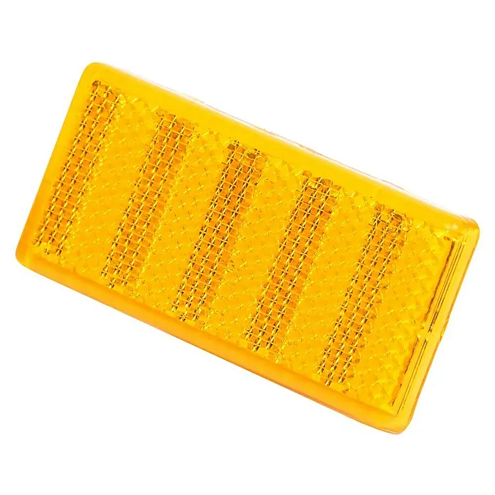 Stema Reflektor - Gelb, 2 Stk. - Gelber Straßenmarkierungsreflektor mit einer Oberfläche aus reflektierendem Prismenmaterial.
