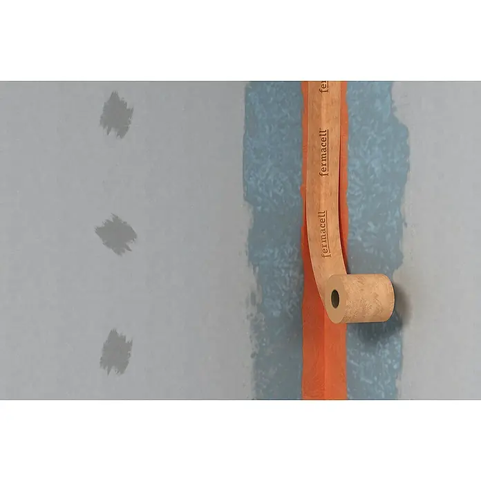 Fermacell Dichtband - 5 m x 12 cm - Nahaufnahme eines Rolle Fermacell Fugendeckstreifens, ein wesentliches Element für glatte und nahtlose Trockenbauoberflächen.