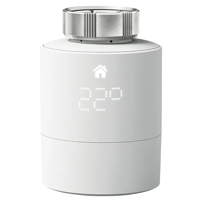 Tado Smartes Termostato de radiador Universal - M30 x 1,5 mm, Funciona con pilas - Termostato inteligente de radiador en blanco con pantalla digital y botón plateado para el control de temperatura.