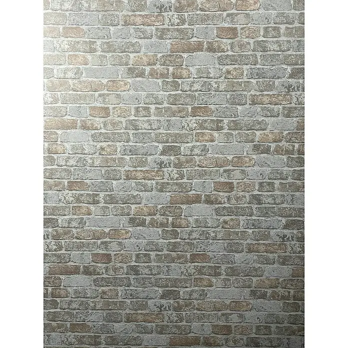 Marburg Sand & Stones Vliestapete Steinmauer II - Graubeige, Steinoptik, 10,05 x 0,53 m - Eine Nahaufnahme einer Wand mit Ziegelsteintapete in Grau-, Braun- und Beigetönen, die eine realistische Mauerwerksoptik erzeugt.