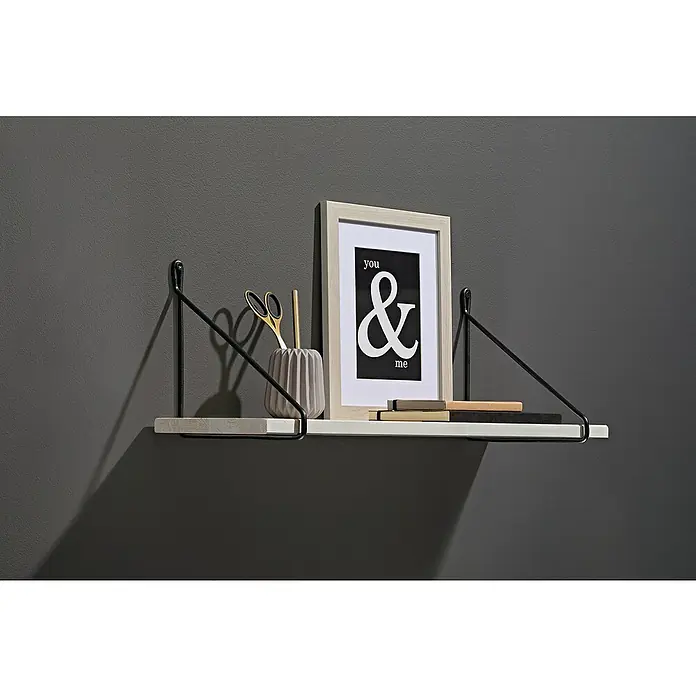 Dolle Wandkonsole Fil - L x B: 21 x 21 cm, Schwarz, Belastbarkeit: 30 kg - Nahaufnahme eines Wandregals mit dekorativen Elementen, darunter ein Bilderrahmen mit der Aufschrift "You & Me".