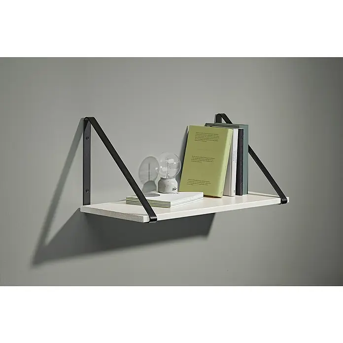 Dolle Wandkonsole - 250 x 25 x 250 mm, Belastbarkeit: 25 kg, Metall, Schwarz - Wandregal mit Büchern und einer Lampe. Das Regal hat eine weiße Ablagefläche und schwarze Halterungen.