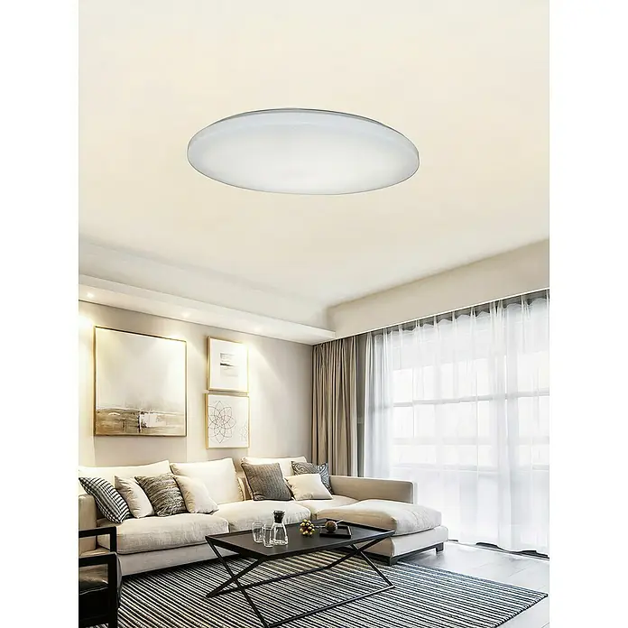 Tween Light Plafón LED redondo Skyler Star - 80 W, Ø x Al: 74 x 10 cm, Blanco, RGBW - Esta imagen muestra una lámpara de techo redonda y moderna que ofrece una iluminación suave y difusa, perfecta para espacios habitables.