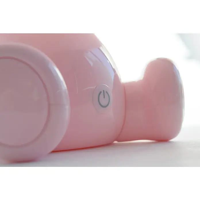 Idp Lampshades Lámpara de sobremesa LED Bunny - 3 W, Ø x Al: 19,5 x 30 cm, Rosa - Primer plano de un producto rosa con un botón de encendido, que muestra un diseño moderno y minimalista.