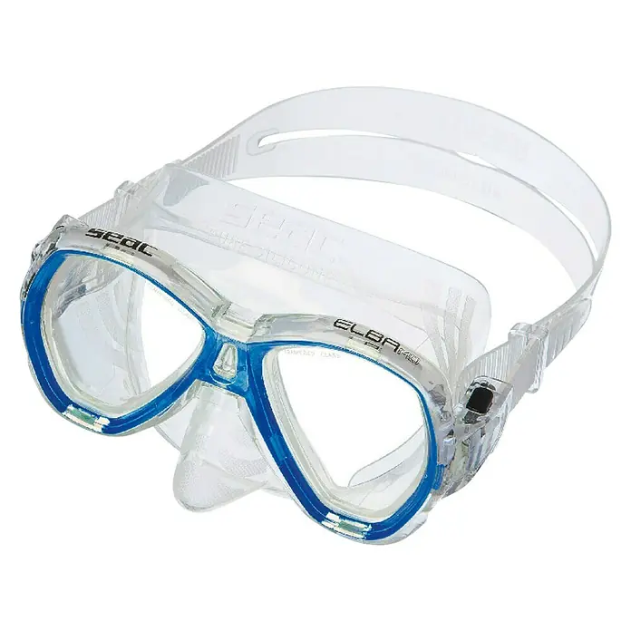 Seac Sub Set de buceo Elba Jr - Azul, Válvula de salida de agua - En la imagen se muestra una máscara de buceo Seac Elba con faldón de silicona transparente y detalles azules, con lentes de vidrio templado.