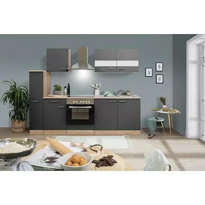 Respekta Singleküche Merle Typ 1 - Breite: 240 cm, Grau, Mit Elektrogeräten, Volumen Backofen: 72 l - Moderne Einbauküche mit dunkelgrauen Schränken, hellen Holz-Arbeitsplatten und Edelstahlgeräten, in einer gemütlichen Küchenumgebung.