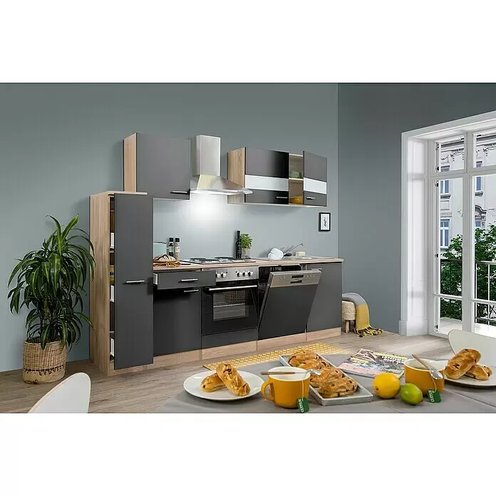 Respekta Singleküche Merle Typ 1 - Breite: 250 cm, Grau, Mit Elektrogeräten, Volumen Backofen: 60 l - Moderne Küchenzeile mit dunkelgrauen Schränken, hellen Holzdetails und Geräten. In einem Raum mit Fenster und Frühstückstisch.