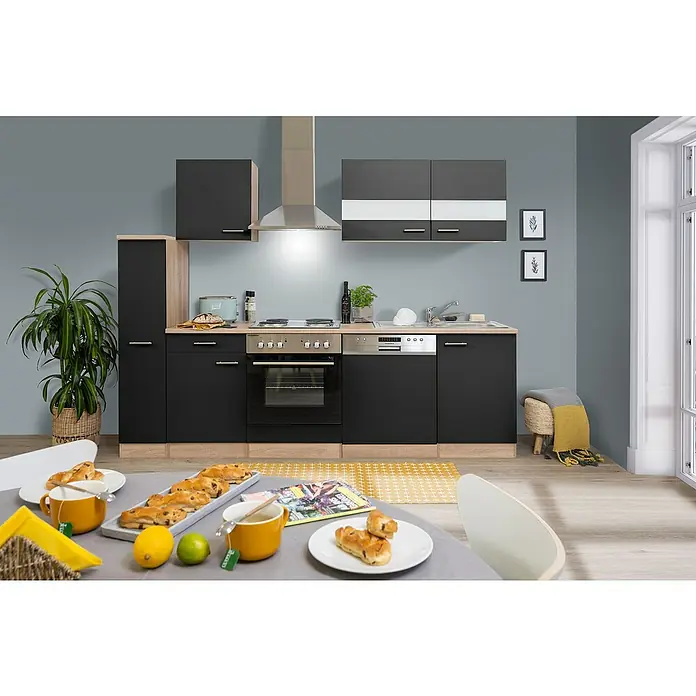 Respekta Singleküche Merle Typ 1 - Breite: 250 cm, Schwarz, Mit Elektrogeräten, Volumen Backofen: 60 l - Moderne Küche mit schwarzen Schränken, Arbeitsplatte in Holzoptik und Edelstahlgeräten. Eine Zimmerpflanze sorgt für einen Farbakzent.
