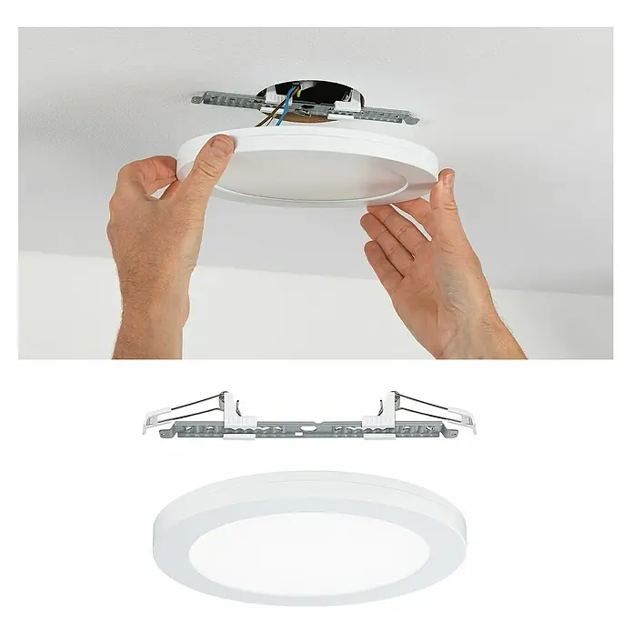 Paulmann LED-Einbauleuchte Cover-it - 18 W, Neutralweiß - Das Bild zeigt eine runde LED-Deckenleuchte in Weiß, die installiert wird, zusammen mit einer Halterung für die Deckenmontage.