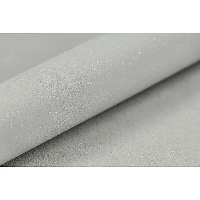 Rasch Vliestapete Flitter - Grau, Uni, 10,05 x 0,53 m - Nahaufnahme einer Rolle strukturierten, hellgrauen Stoffes mit subtilem Glitzereffekt, ideal für elegante Polster- und Dekorationsprojekte.
