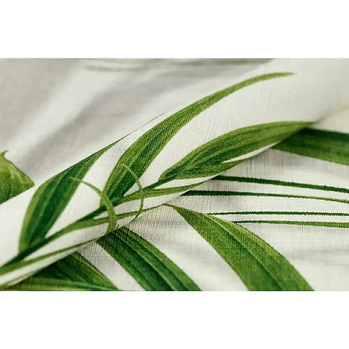 FREUNDIN HOME COLLECTION III Vliestapete Blätter - Weiß/Grün, Floral, 10,05 x 0,53 m - Nahaufnahme eines Stoffes mit einem Blattmuster in Grün und Weiß, der für Möbel oder Dekorationen verwendet werden kann.