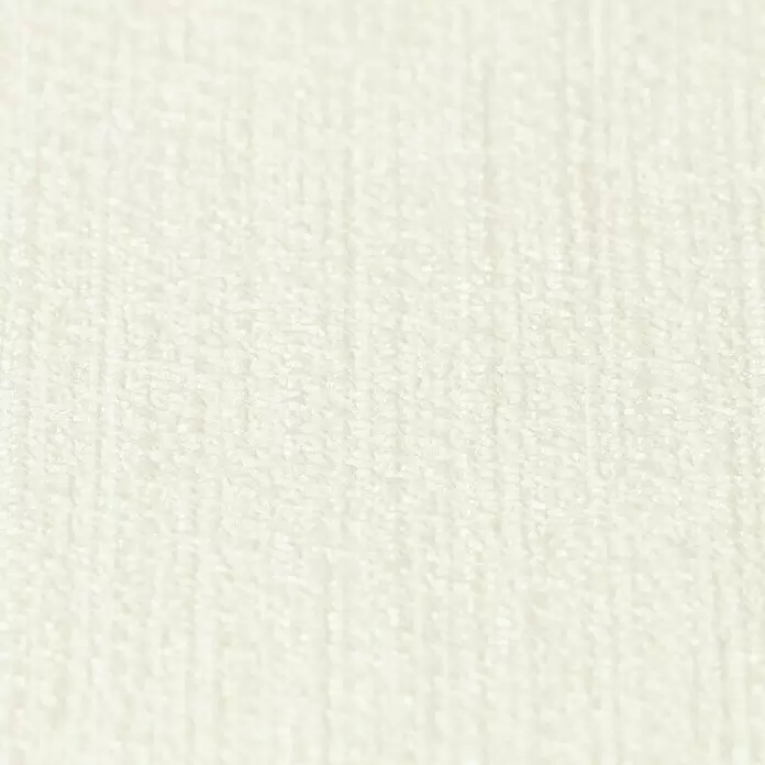 Rasch BARBARA Home Collection II Vliestapete - Hellbeige, Uni, 10,05 x 0,53 m - Nahaufnahme eines cremefarbenen, weichen, strukturierten Stoffes.