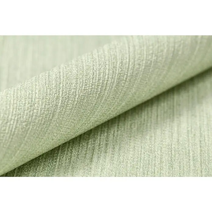 Rasch BARBARA Home Collection II Vliestapete - Pastellgrün, Uni, 10,05 x 0,53 m - Nahaufnahme eines hellgrünen Rollenstoffes, der eine feine Textur und dezente Eleganz für Polster- oder Dekorationsprojekte bietet.