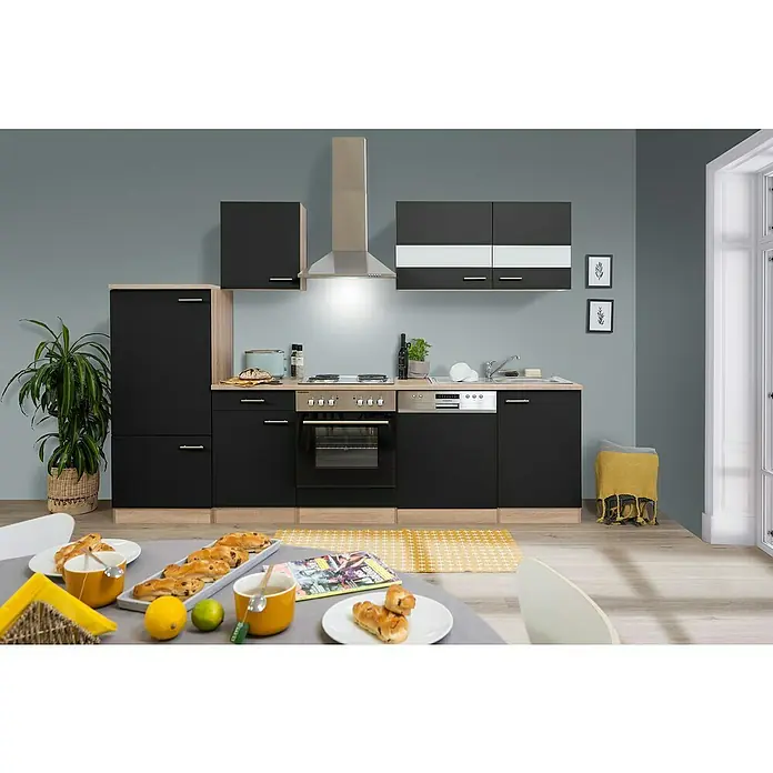 Respekta Küchenzeile Merle - Breite: 280 cm, Schwarz, Mit Elektrogeräten, Volumen Backofen: 58 l - Ein Küchenbereich mit schwarzen Schränken, Arbeitsplatten aus hellem Holz und einer Auswahl an Backwaren auf einem Tisch.