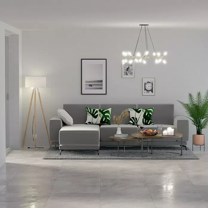 Feinsteinzeugfliese Bayona Silver - 60 x 60 cm, Grau, Glänzend - Modernes Wohnzimmer mit grauem Ecksofa, grünen Blattkissen, runden Couchtischen, einer Pflanze und eleganter Beleuchtung.
